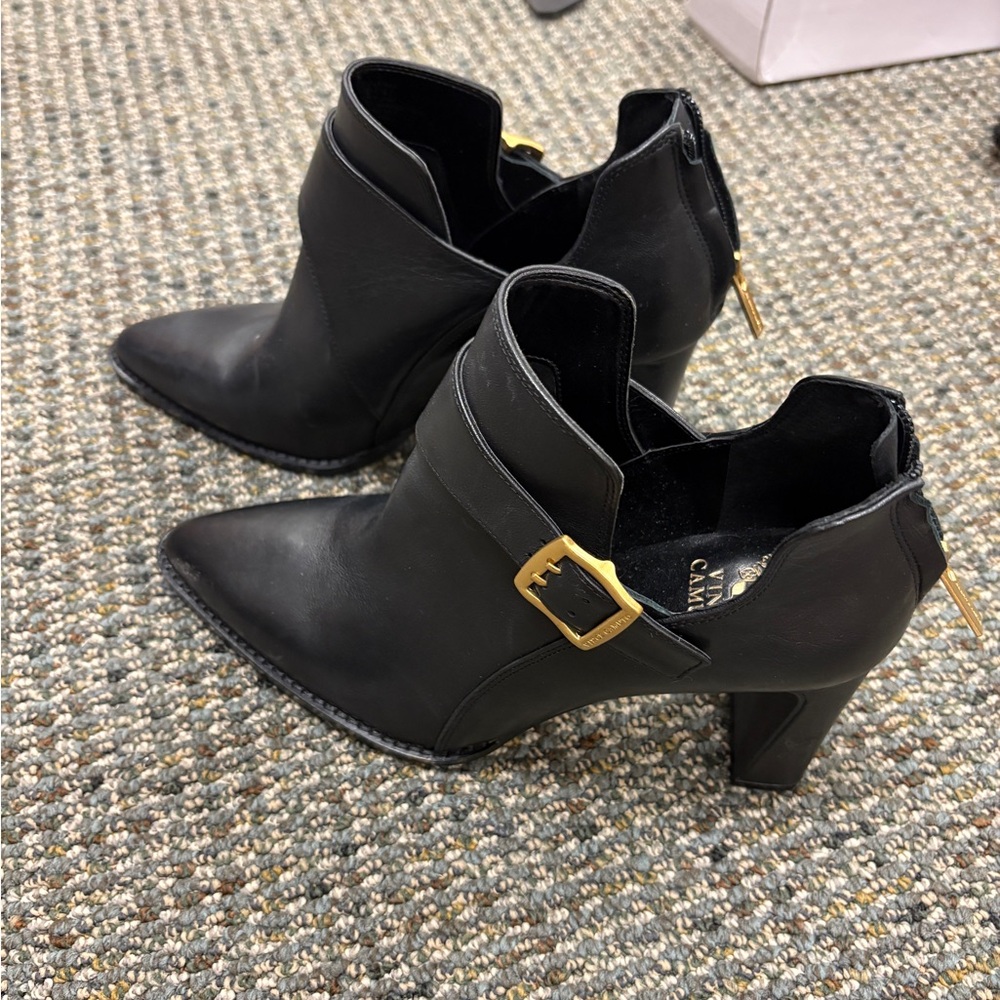 Vince Camuto Black and Gold Ankle Booties with Sleek Design